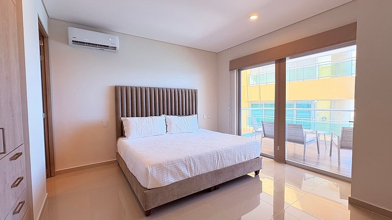 Lujo frente al mar con terraza privada en Zona Dorada