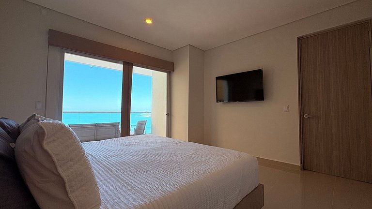 Lujo frente al mar con terraza privada en Zona Dorada