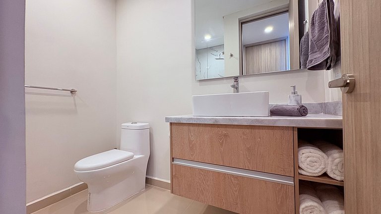 Lujo frente al mar con terraza privada en Zona Dorada